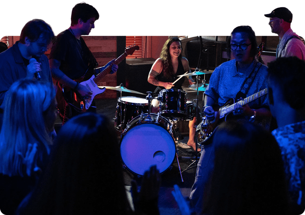 Musicians playing together on stage
