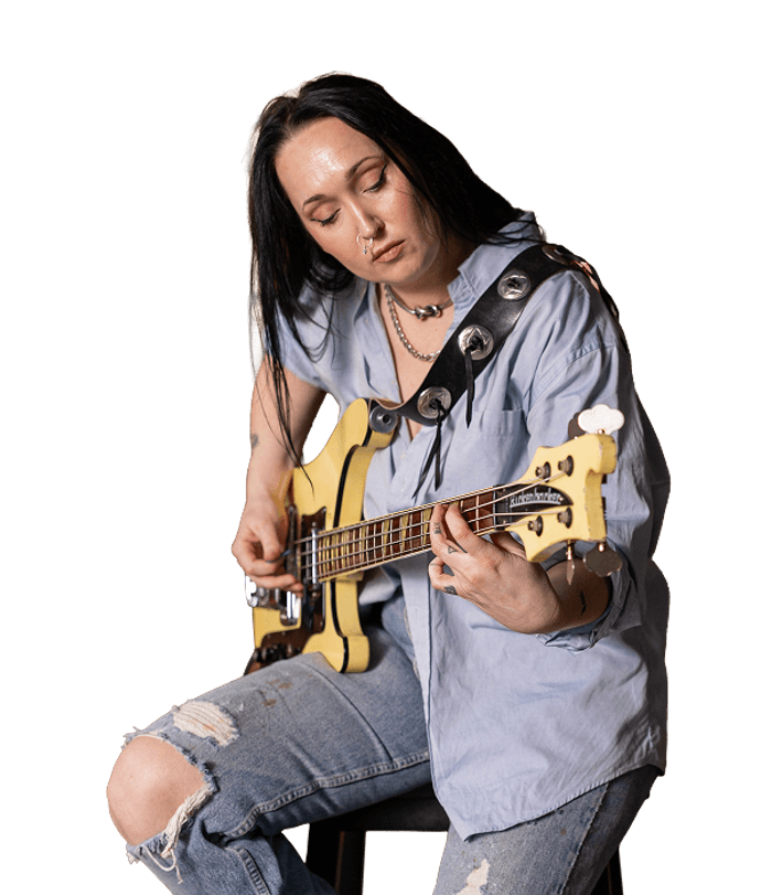 Guitarist playing seated